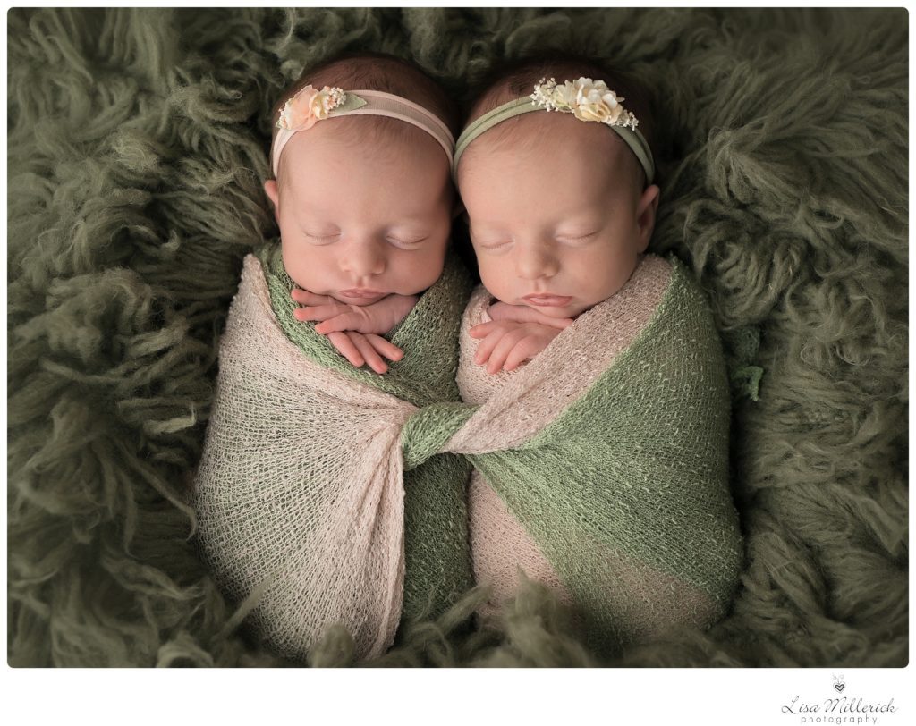 twin newborn girls sage green wrapped