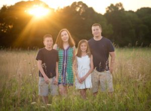 siblings brothers sisters sunset field photography