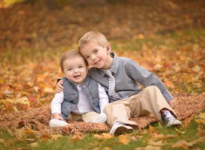 brothers fall leaves photo sibling