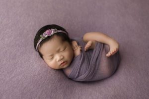 baby girl pink swaddle bed purple ct newborn photo