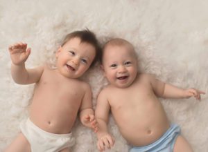 twins brothers happy smiles 9 months