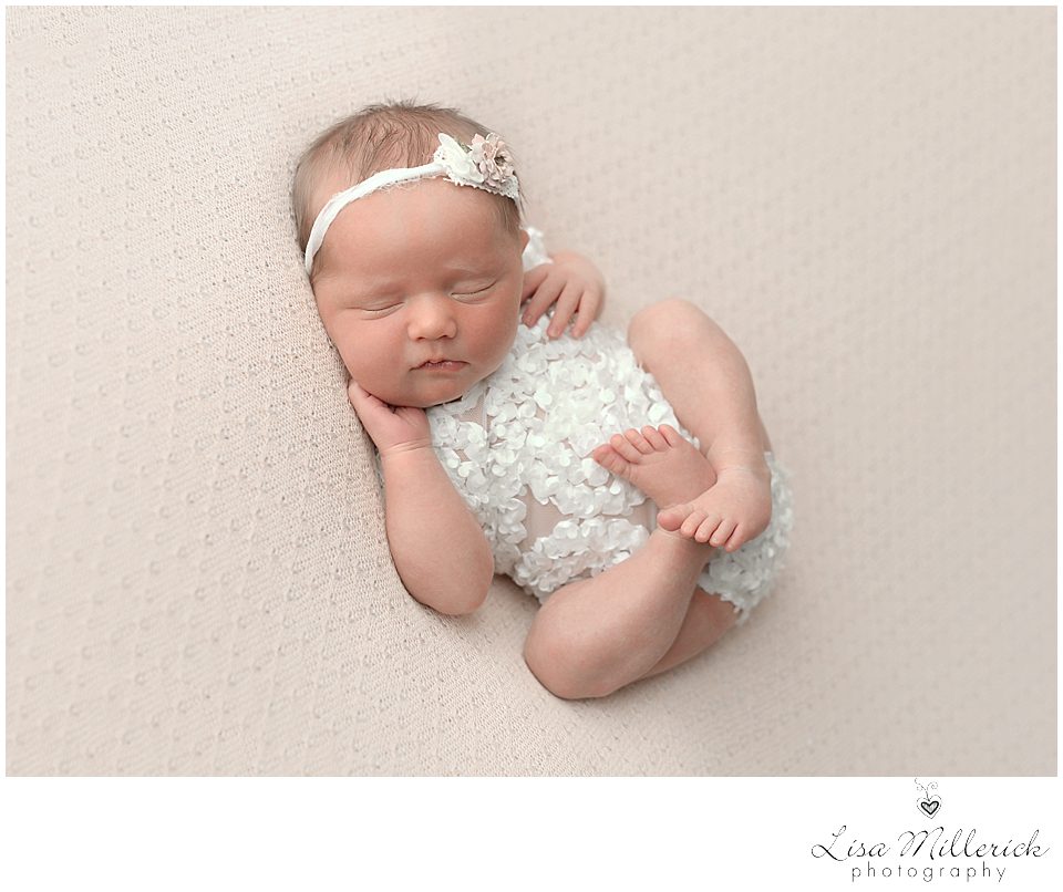 newborn baby girl white romper