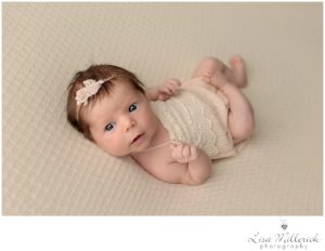 bright eyed newborn baby girl picture