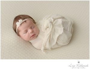 simple classic newborn girl wrapped